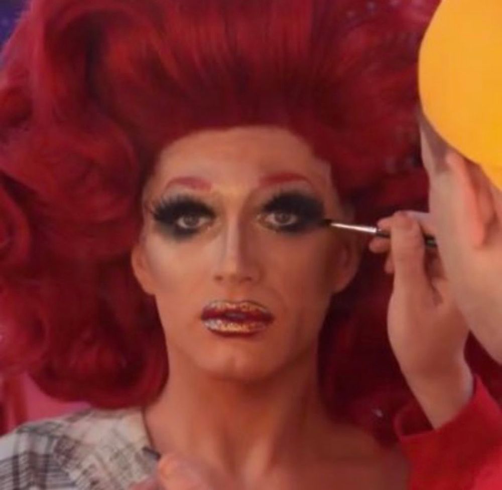 Tina Burner applying a heavy hand of makeup to Rosé on Ru Paul’s Drag Race 