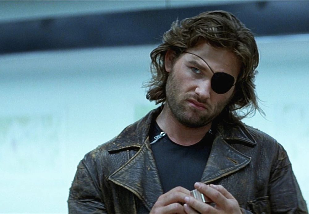 Kurt Russell playing the character Snake Plissken