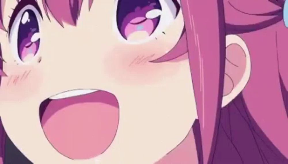 a close up of a pink anime girl with purple eyes and a smile on her face .