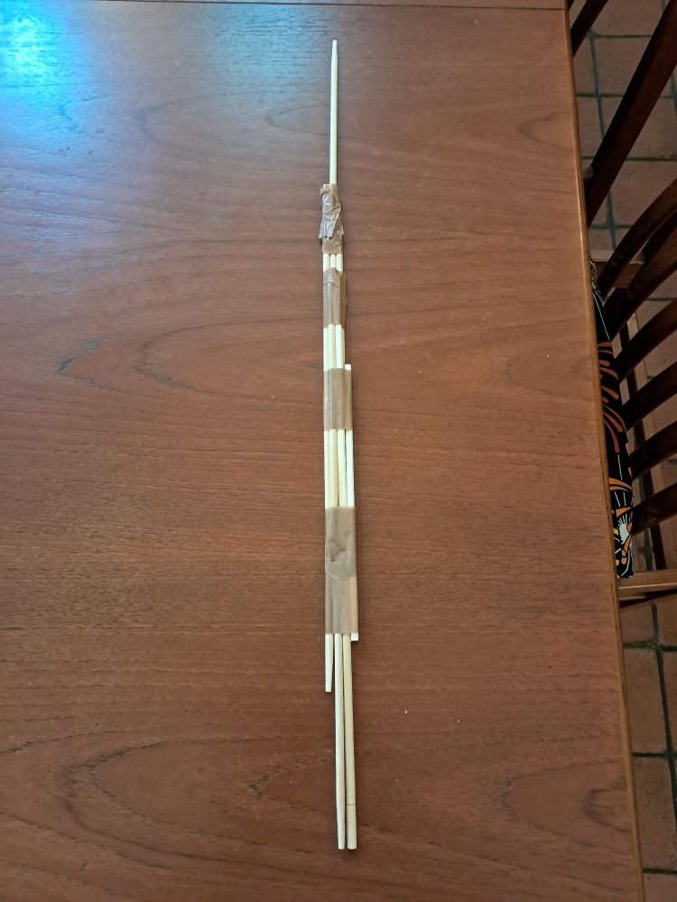 A demo killing sword made out of 12 chopsticks and packing tape. Suspect it will fall apart the first time it is waved in anger, which is probably a good thing. 