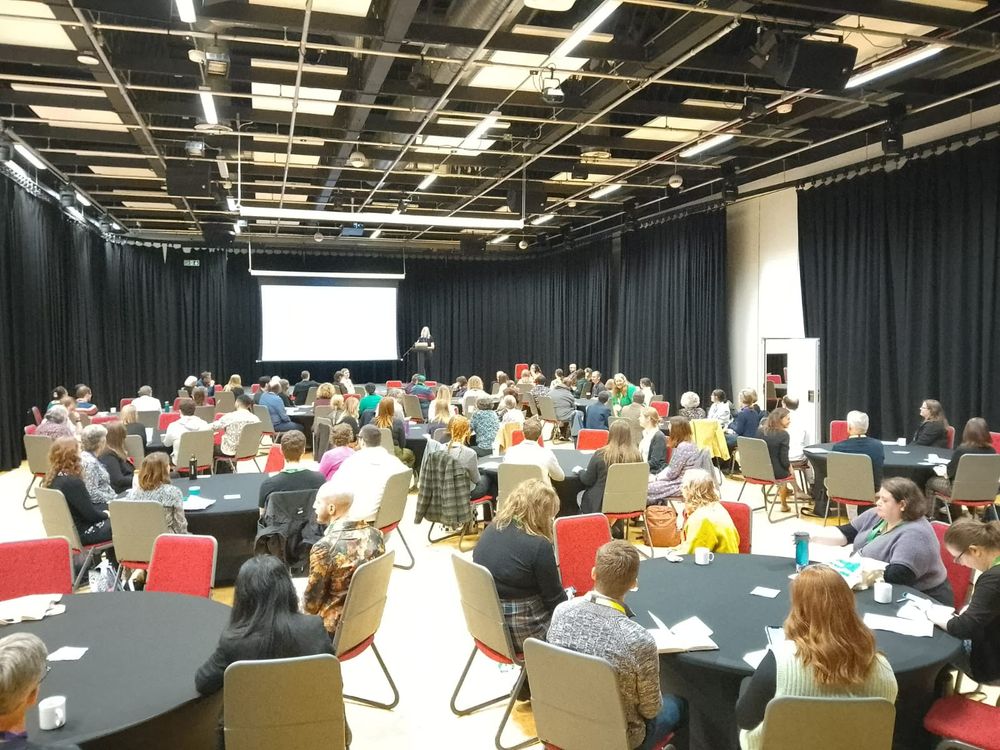 Photo of Mercian 24 Conference delegates watching a presentation