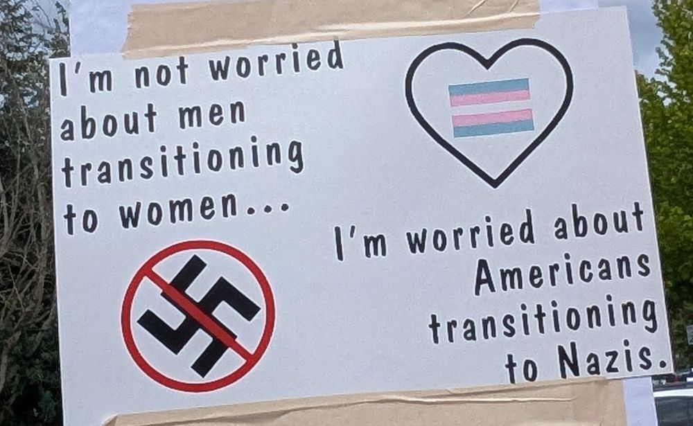 Protest sign: I'm not worried about men transitioning to women...I'm worried about Americans transitioning to Nazis