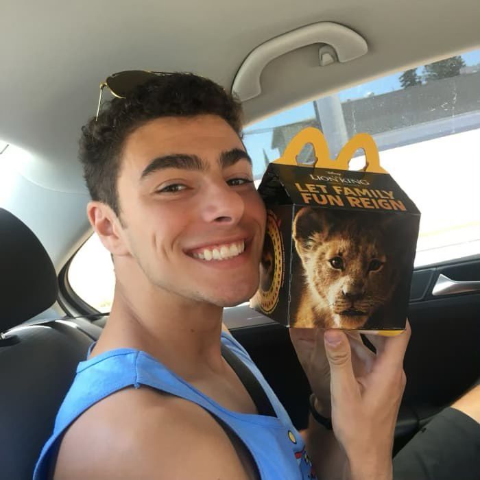 Luigi Mangione with a happy meal
