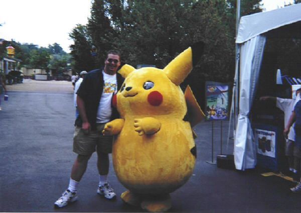 A picture of me with someone in the sports mascot-style Pikachu outfit.