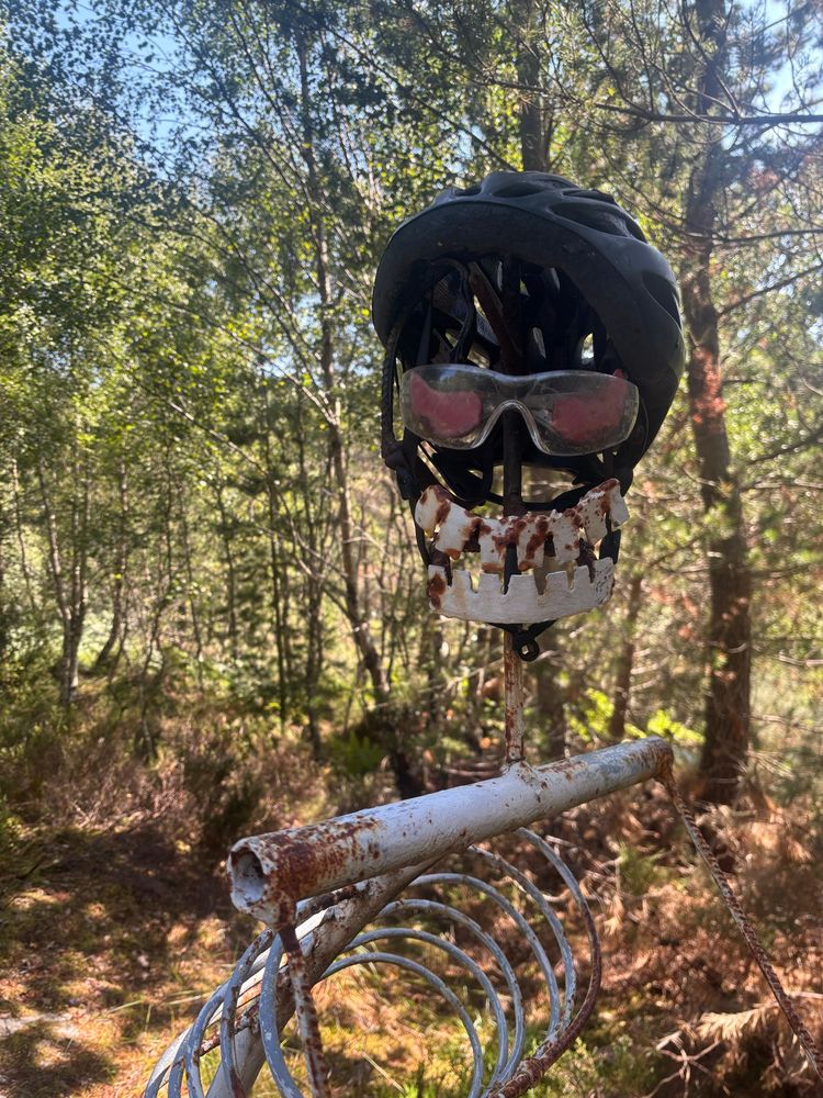 Close up of the ‘Skeleton’ cyclists face, he’s wearing shades to look cool though he’s looking a bit rusty with age