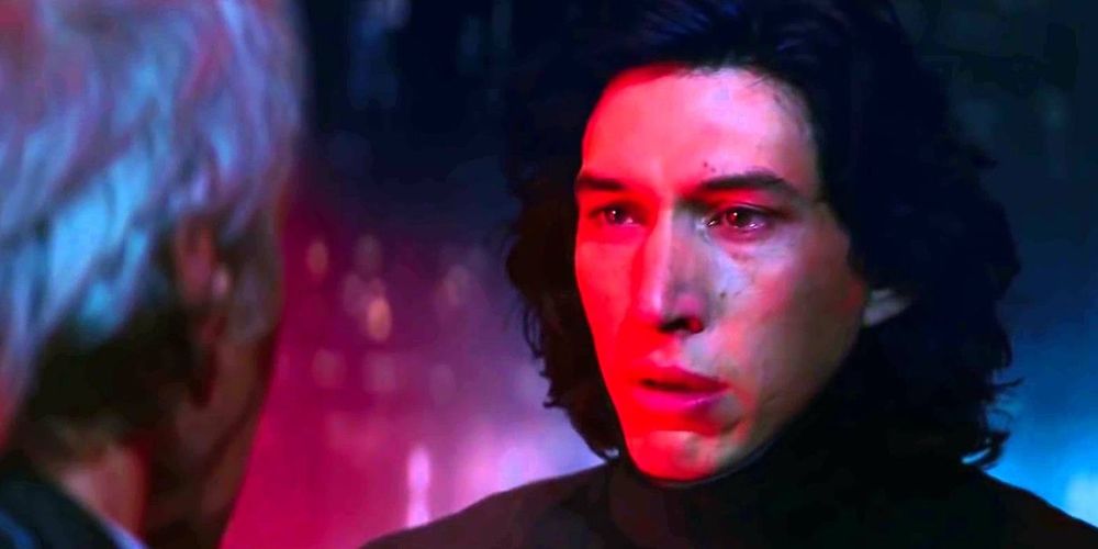 A very conflicted, emotional Kylo Ren/Ben Solo speaking with his father, Han Solo, in a scene from The Force Awakens.