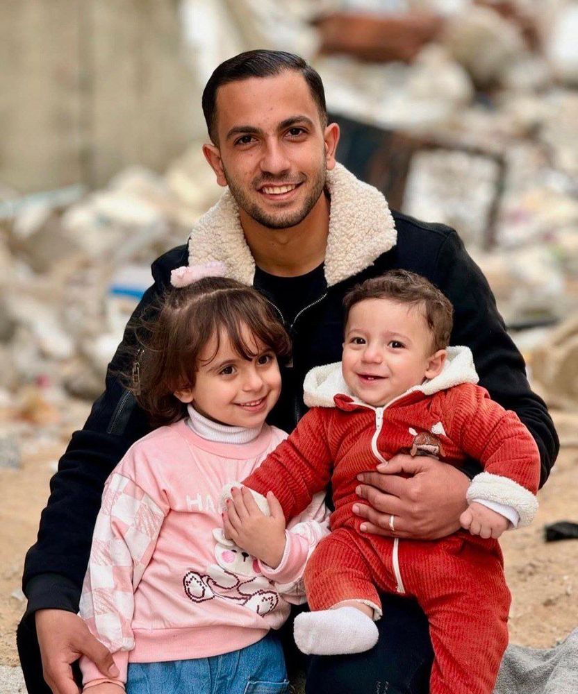 Anas Al-Sharif and his two young children