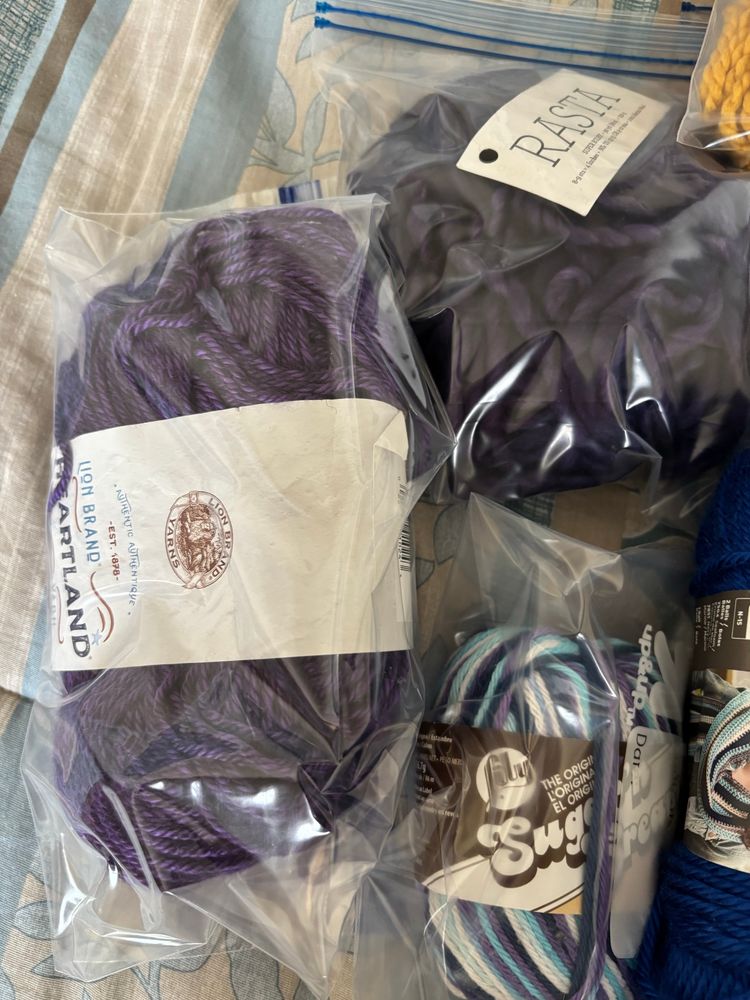 Close up of half the first picture of partial skeins of yarn