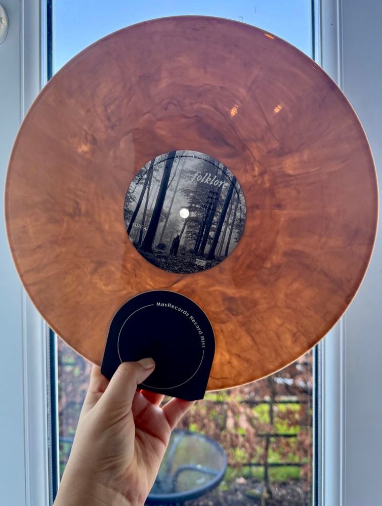 Standard folklore variant vinyl with a marble pressing in the light 