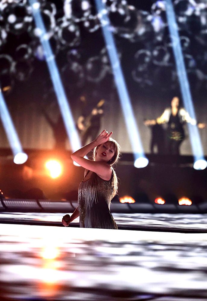 Taylor Swift exiting the stage after fearless set 