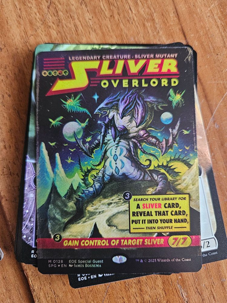 A magic the gathering card called sliver overlord. Its drawn like an old pulp scifi cover. Plus its nice and shiny.