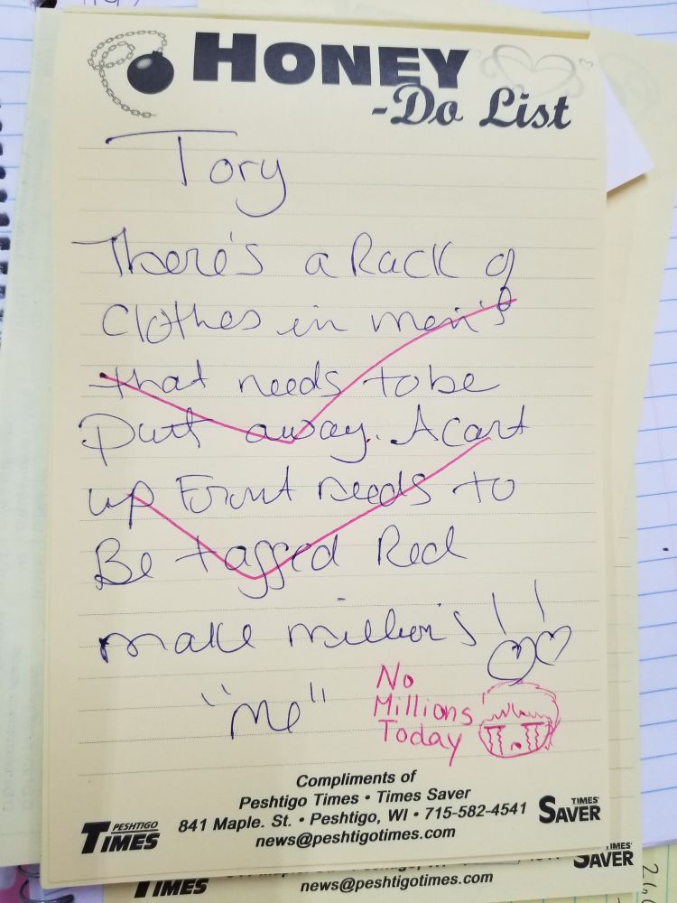 A handwritten note on a Honey-Do List notepad. In blue ink, written by Ruth: "Tory [sic], There's a rack of clothes in mens that nerds to be put away. A cart up front needs to be tagged red. Make millions! ~Me".

In pink ink, written by me (Tori/Kierstal):  "No millions today" and a chibi cry face, as well as a large checkmark through each of the tasks written in blue to indicate I did the things