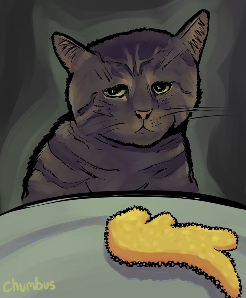 A sad cat looks despairingly upon a dinosaur chicken nugget.