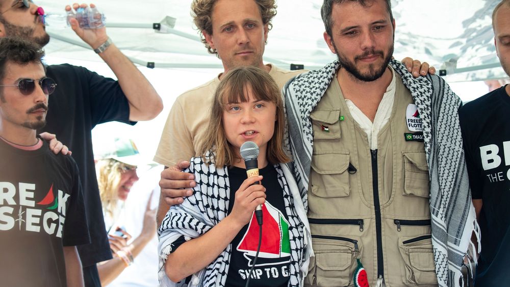 Greta Thunberg in a keffiyeh speaking aboard the FFC aid ship end route to Gaza