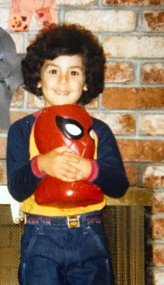 Little KG holding his Spidey candy bucket and rockin’ the Spidey belt