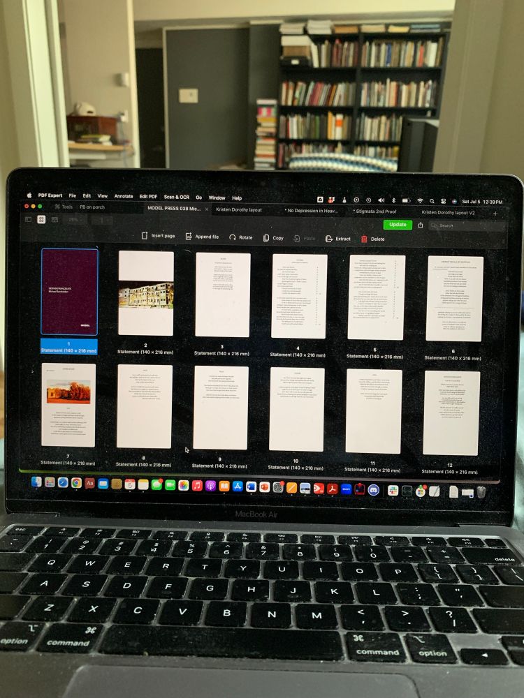 Photo of a computer with the layout for a new poetry chapbook on the screen