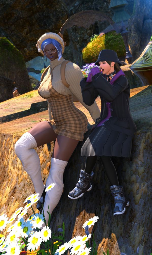 Valti dressed in the Fall Bear themed outfit, Edda in her 999 murder fit. Edda is chomping on a piece of chocolate.