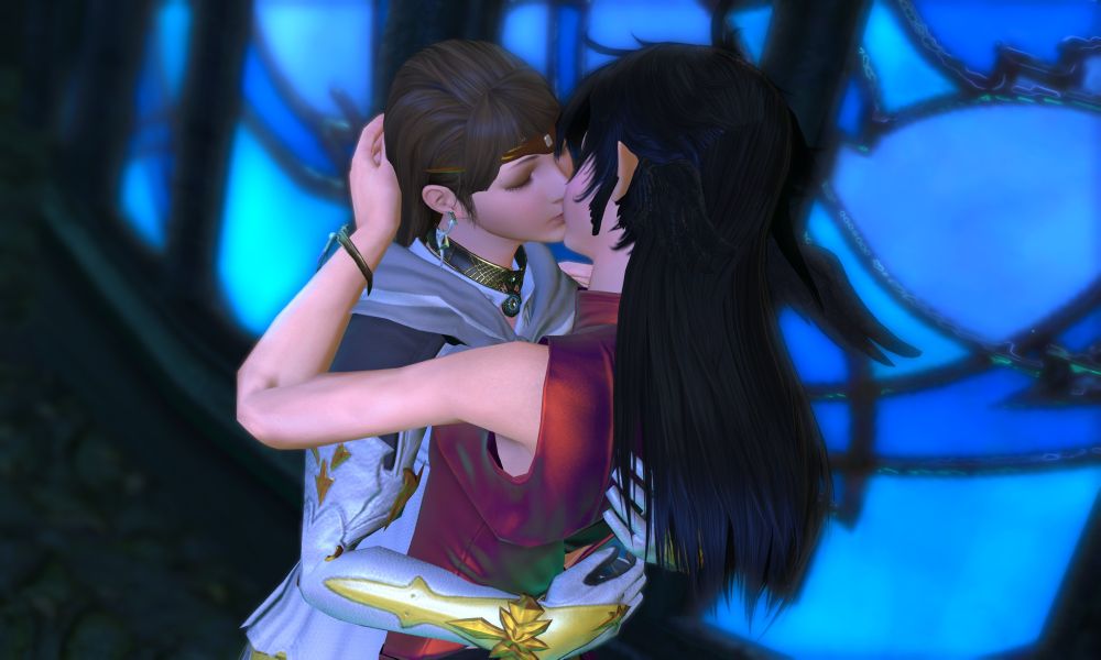 Edda kisses Alisaie, holding her tight against her. Alisaie has raised her hand to cup the back of Alisaie's head, kissing back.