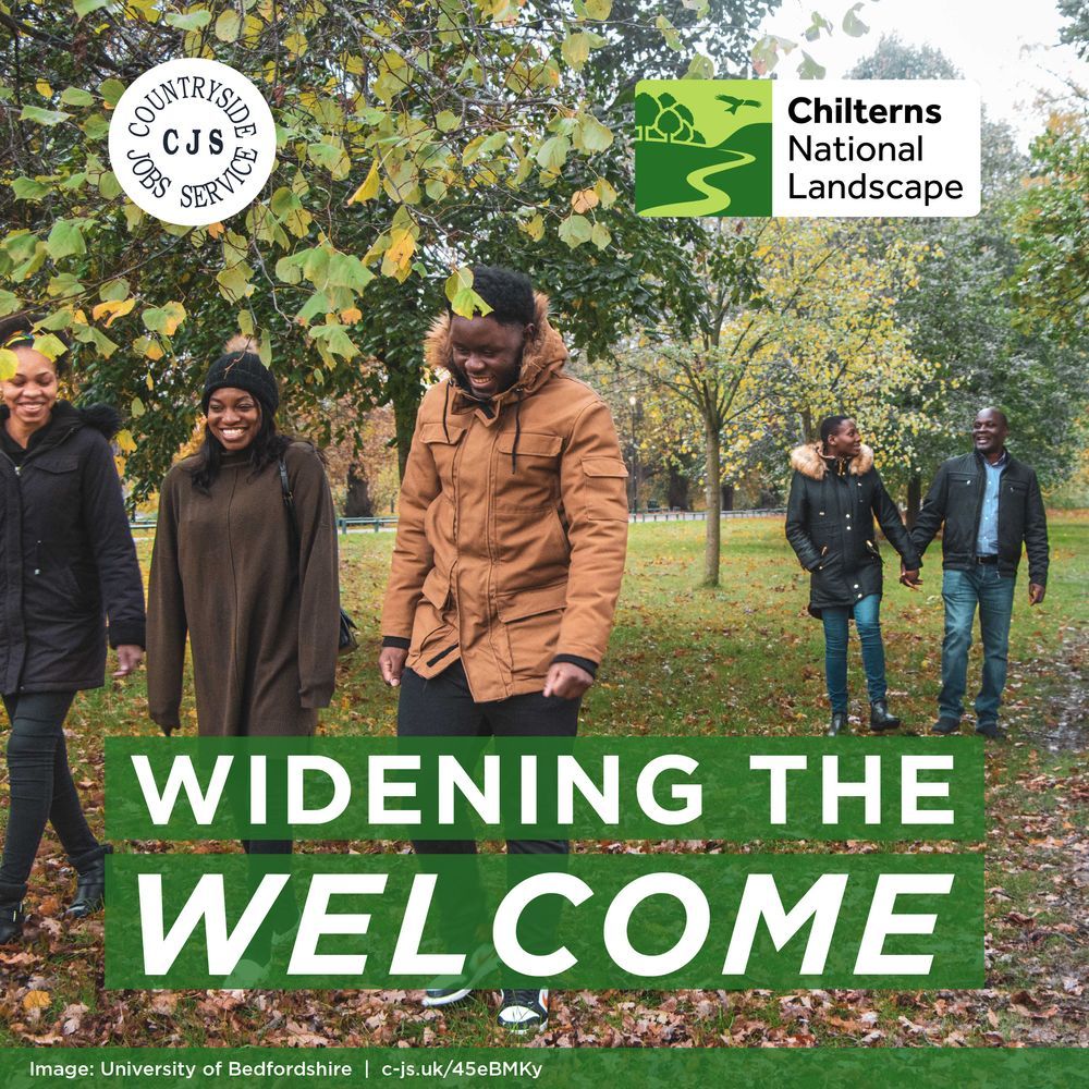 A group of people walk through a park. The leaves on the trees are turning and yellow and there are brown leaves on the ground. Text reads: Widening the welcome