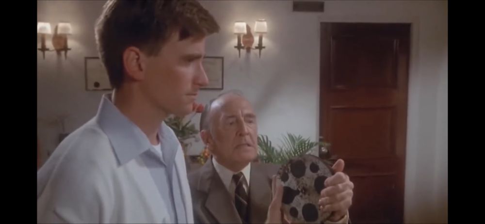 Mr. Carter in “Porky’s Revenge” holds up reel from a stag film and explains how he, “sat through every disgusting frame of this film. Twice.”