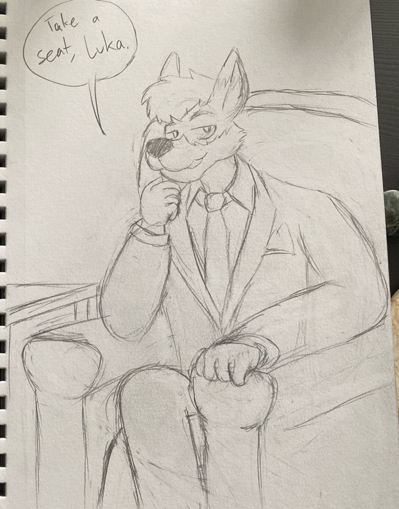 A foxroo in a suit sits in a big, comfy chair beside a desk. “Take a seat, Luka,” he says.