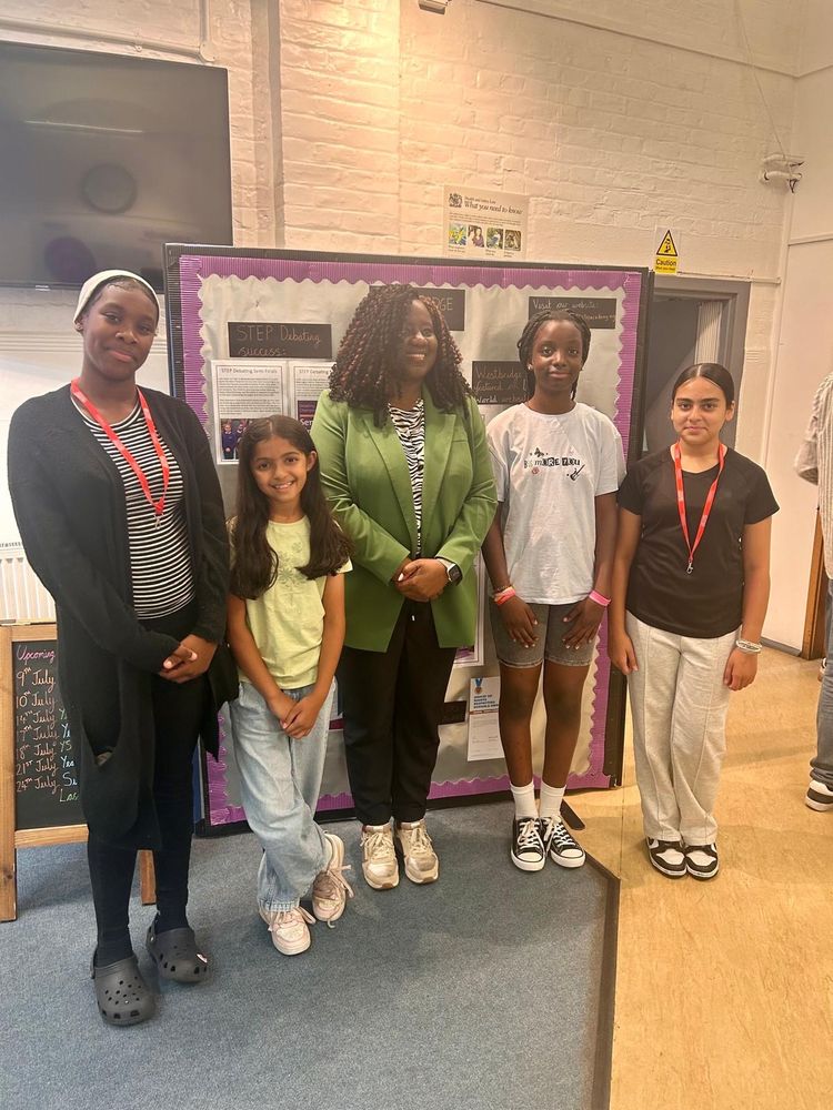 Marsha with four students