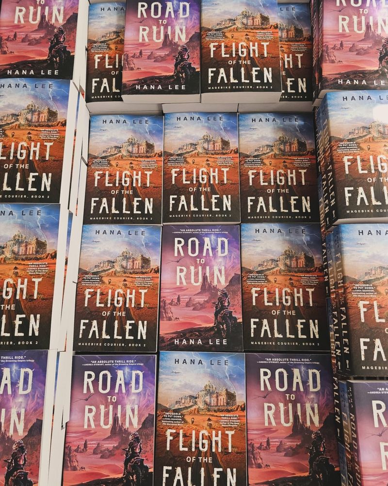 A grid of copies of ROAD TO RUIN and FLIGHT OF THE FALLEN by Hana Lee.