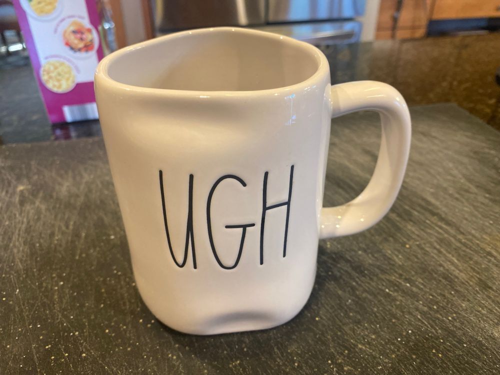 A misshapen coffee mug that just says Ugh