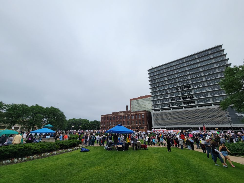 The crowd and tents on the courthouse lawn