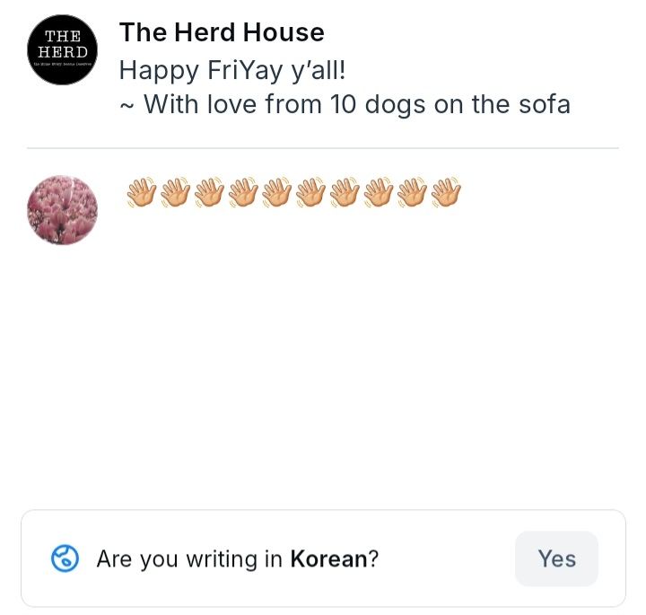 A screenshot of the two posts above — The Herd House sending love from 10 dogs, then my reply with one waving-hand emoji for each of the 10 dogs — followed by a question from Bluesky, which asks, "Are you writing in Korean?"