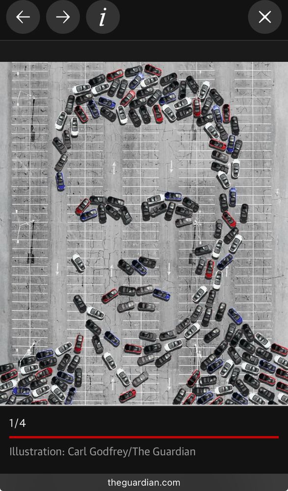 Picture of Elon Musk created from cars in a car park.