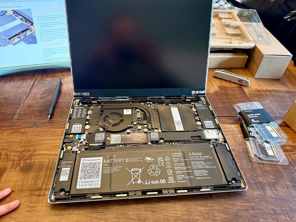 Laptop before keyboard is added with internal components exposed
