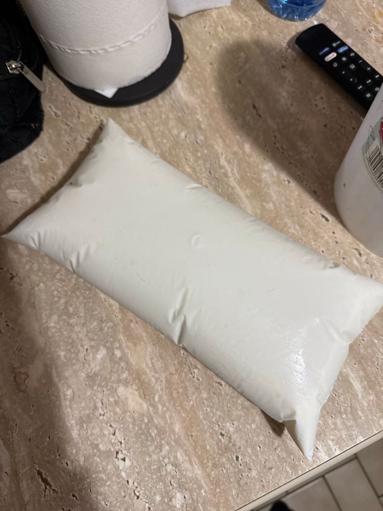 Bagged milk on a table 