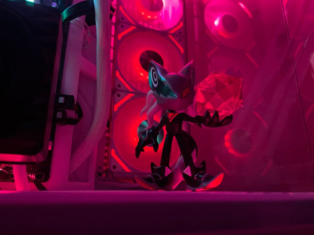 Close up of the little figurine inside my oc case (Infinite from Sonic the Hedgehog)