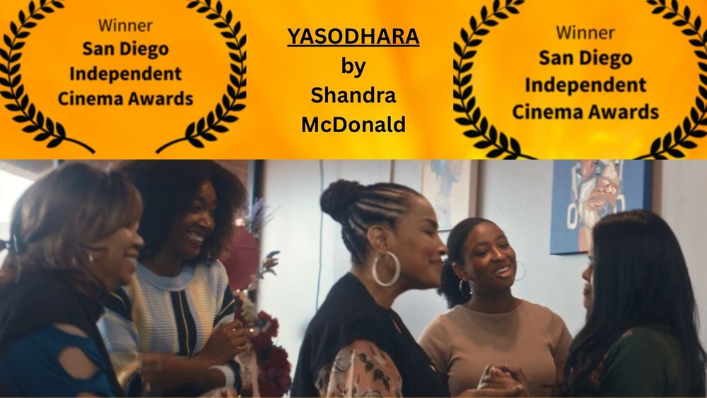 A group of diverse women are gathered together, seemingly engaged in conversation and interacting with each other.