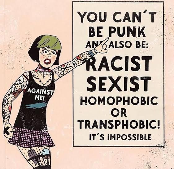 A heavily tattooed punk girl, drawn in the art style of classic Archie Comics, pointing to a sign that reads, "You can't be punk and also be: racist, sexist, homophobic, or transphobic! It's impossible."