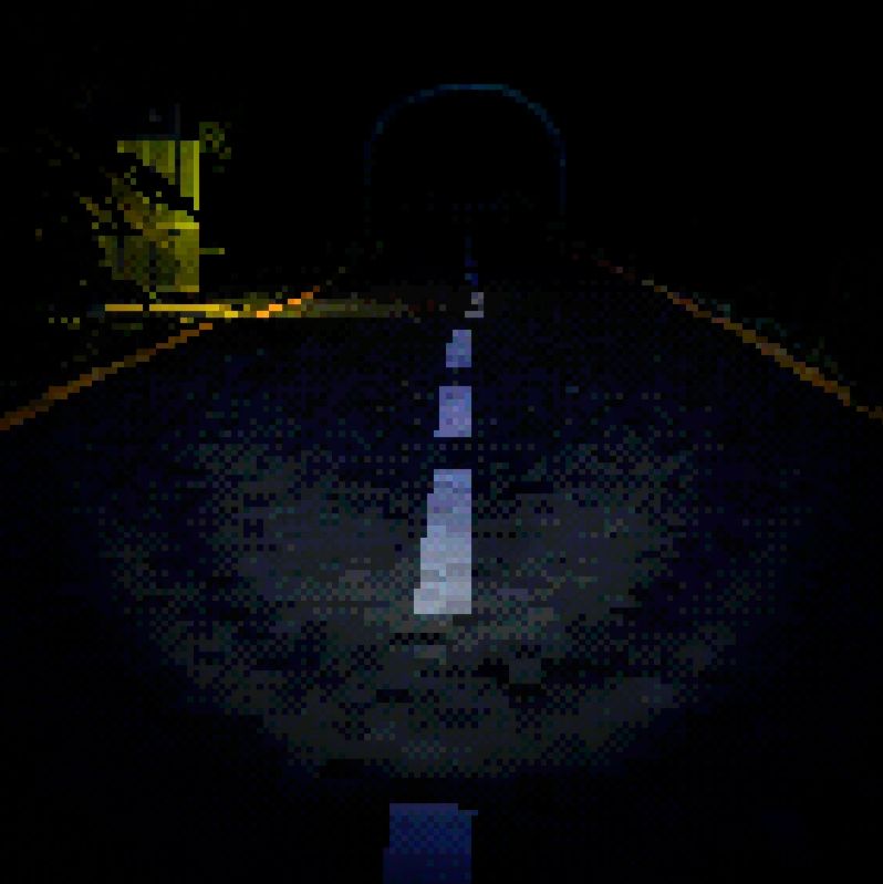 Dark street lighted by a flashlight with a tunnel and payphone in the distance 