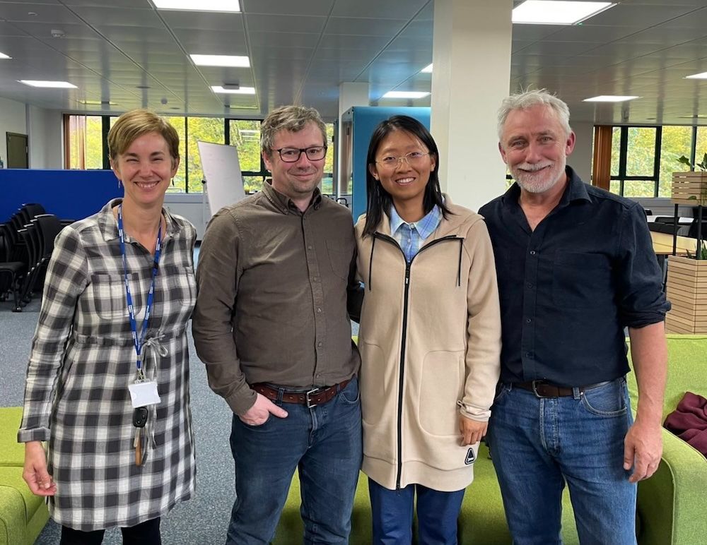 A photograph of Dr Jingyi Yang fresh out of her viva, flanked by me (supervisor) and 2 examiners (Prof Cris Banks-Leite and Prof Gavin Thomas)