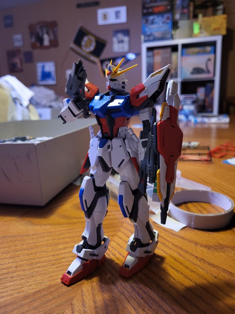 Gundam with gun and shield.