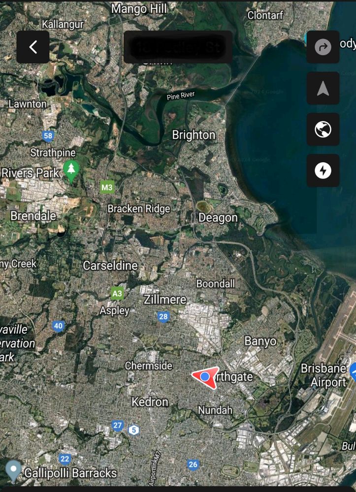 From the Tesla app, a map view of Northern Brisbane suburbs beyond Pine River with no Superchargers available at all.