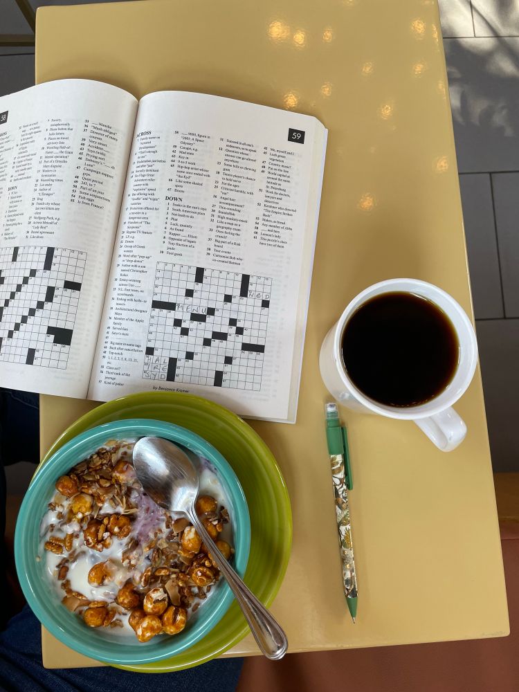 Breakfast and coffee and a book of crosswords.
