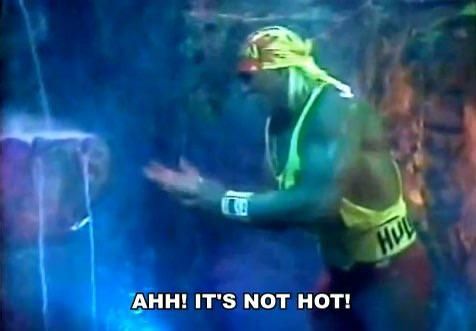 hulk hogan in a weirdly lit cave holding his hand after touching water and screaming AHH! IT'S NOT HOT!