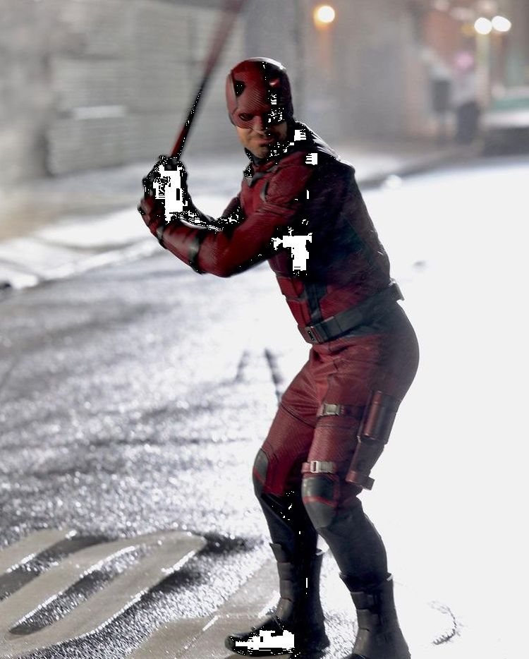 Charlie Cox as Daredevil holding his baton like a baseball bat in Daredevil: Born Again.