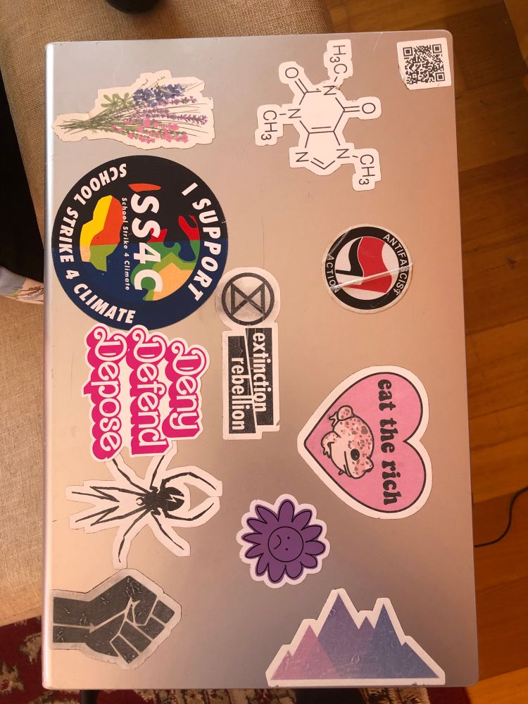 Laptop with stickers. 