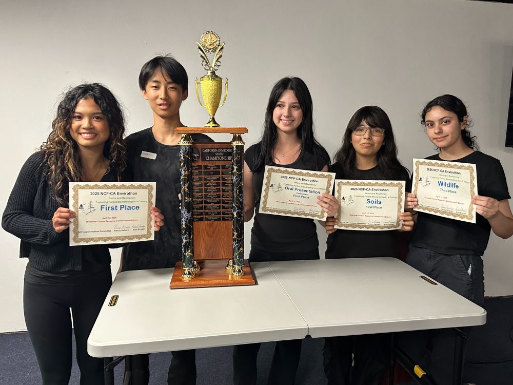 Five high school students stand behind a table with a tall trophy, four of them are also holding certificates of the category awards they won at the competition.

NCF-CA Envirothon proudly announces the 2025 Envirothon winning team from Granada Hills Charter School. It was the EEC's privilege to support the competition yesterday at the Riverside-Corona Resource Conservation District with our long-time member Erin Snyder. This event would not have happened without her incredible dedication and we invite educators in SoCal to get in contact and find out how you can get involved. The EEC is proud to sponsor the their registration and we wish these incredible scholars success as they advance to compete in the NCF-Envirothon in Calagary, Alberta, Canada in July.
 
