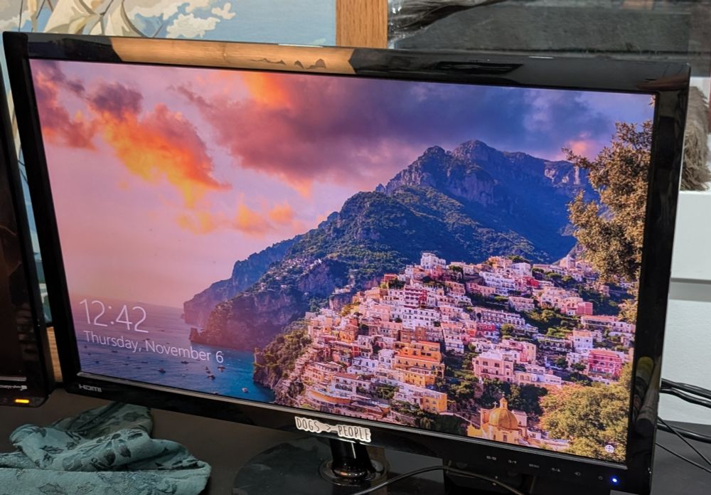 A photo of my computer screen on the log in screen. 