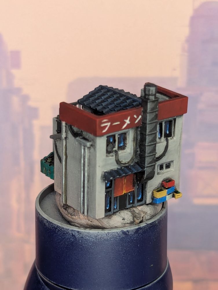 A painted 6mm scale miniature of a ramen shop, viewed from the front.