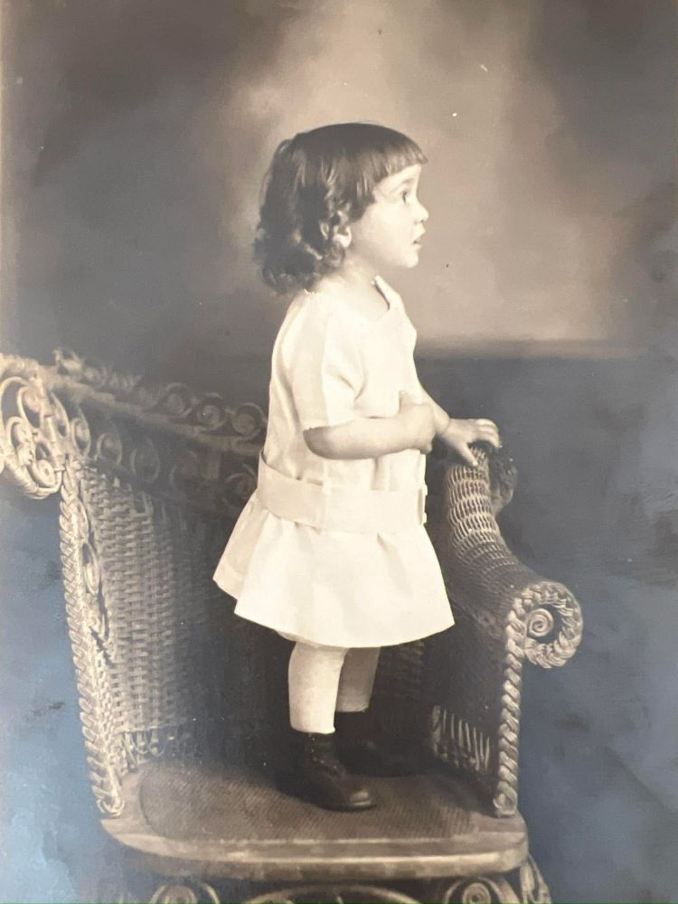 Toddler boy in a dress