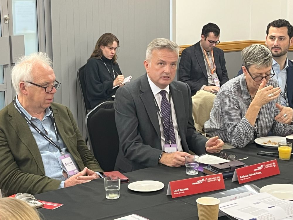 Participants at Work Foundation at Lancaster University roundtable speaking about coastal communities and living standards.