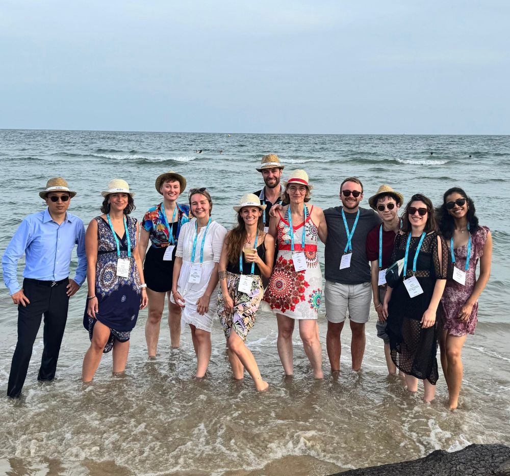 The Goujon Team at the beach party, feet in the sea!